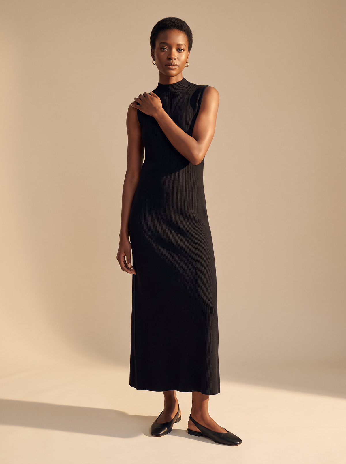 Sleeveless Ribbed Mock Neck Maxi Dress in Black, front view
