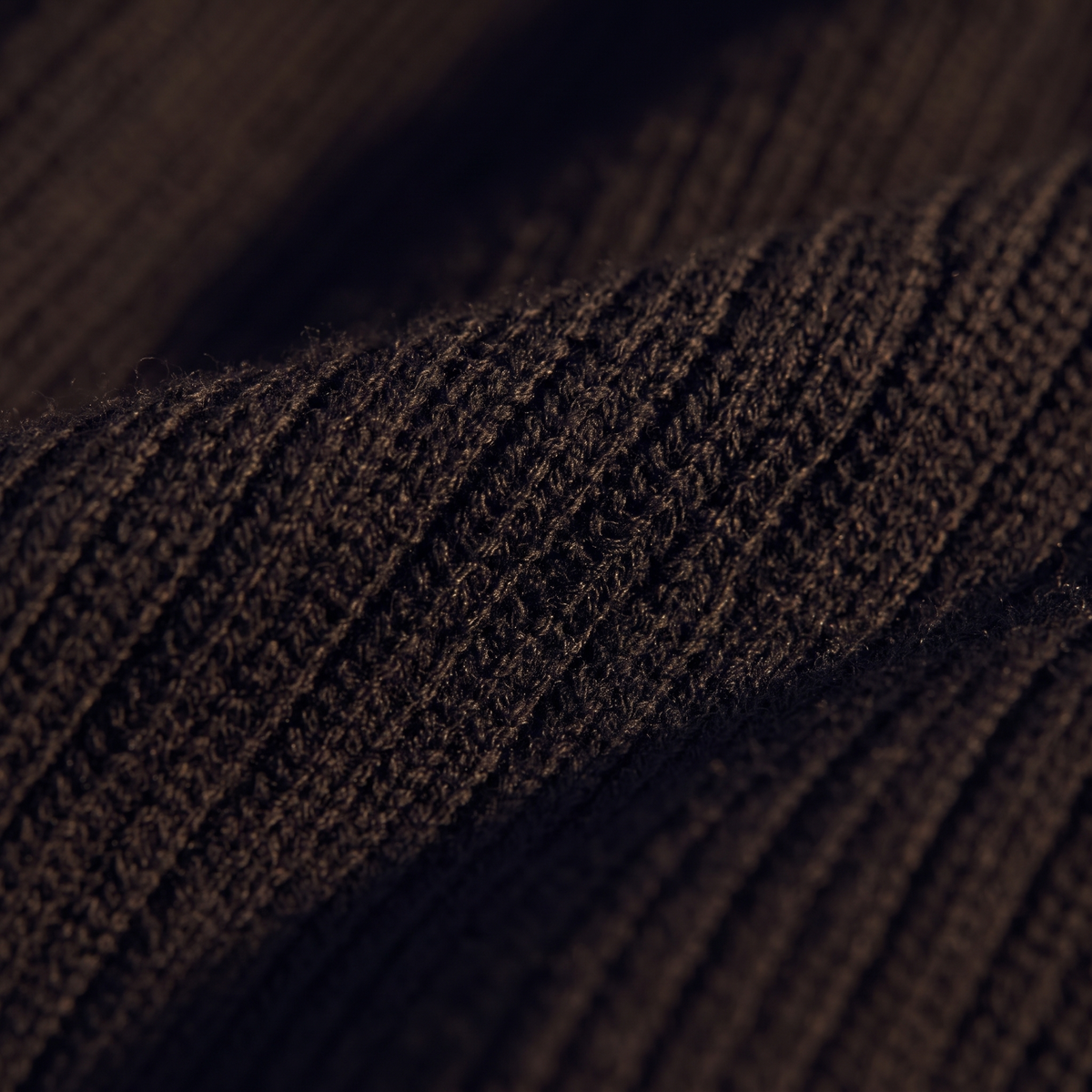 Sleeveless Ribbed Mock Neck Maxi Dress in Black, close-up of the knit