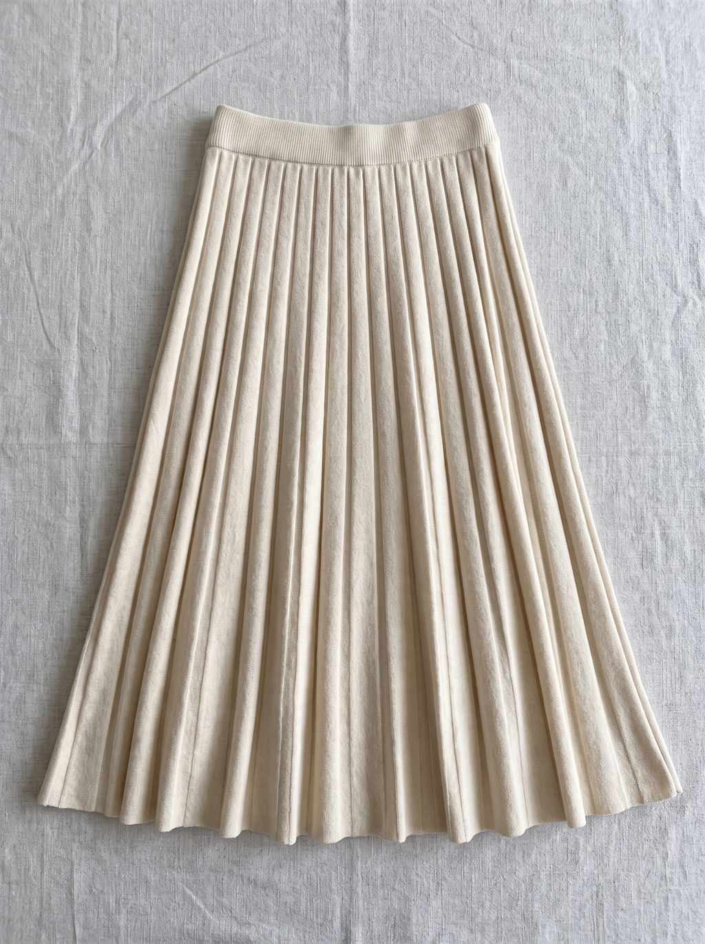 Pleated A-Line Knit Midi Skirt laid flat