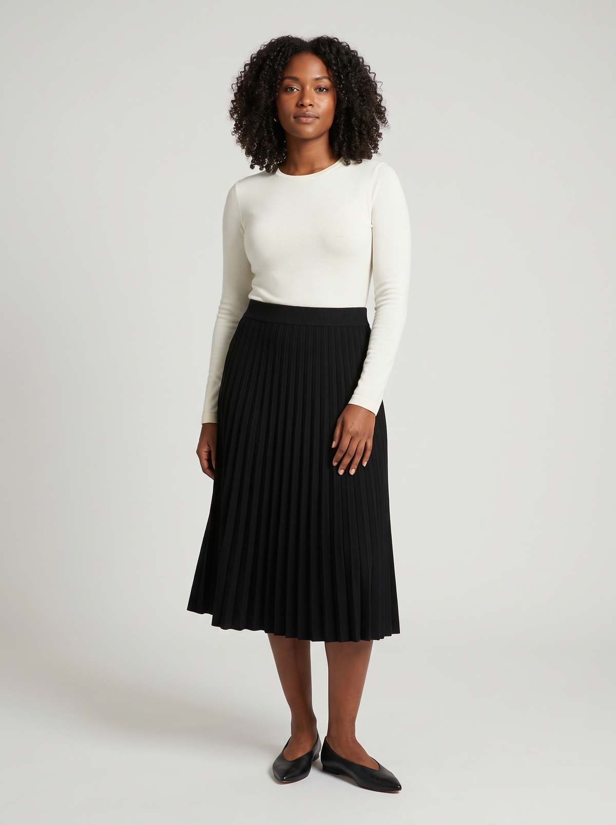 Pleated A-Line Knit Midi Skirt in Black